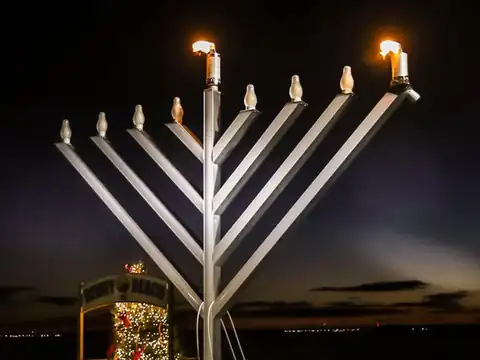 A giant menorah at dusk